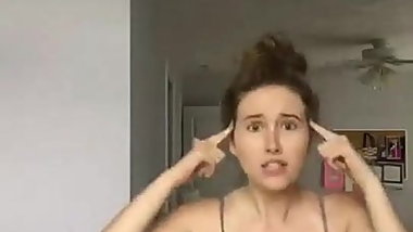 Busty babe doing a little dance - Who is she ?