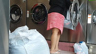 Pregnant teen at the laundromat