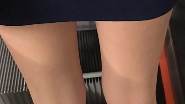 Hot Petite Asian Legs on escalator