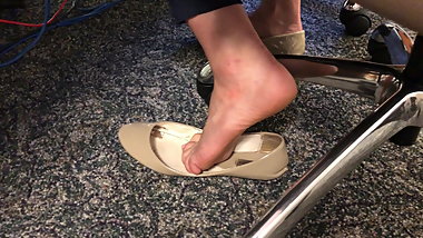Coworker candid barefoot shoe play!