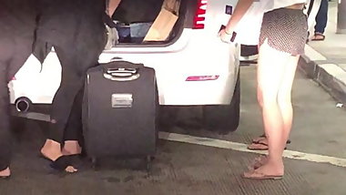Sexy Asian teens curbside at airport