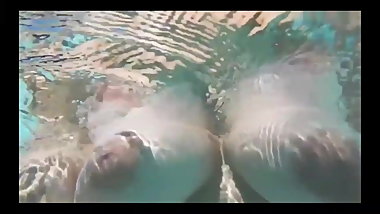 Amazing big tits teen masturbate under the water at the pool