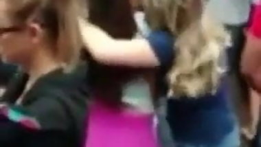 lesbians kissing wildly in a outdoor party