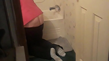 Sister cleaning bathtub