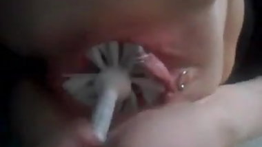 Slave playing with toilet brush