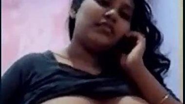Teen show her huge boobs while talking on mobilephone