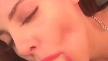 Beautiful and classy girl deepthroats her huge dildo