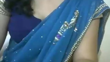 Shy Indian Teen flashes nice tit in webcam