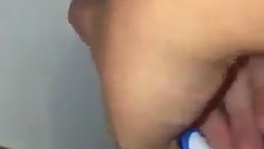 Masturbating with toothbrush