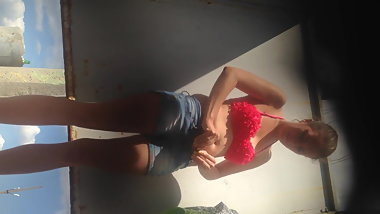 Blonde girl changing swimsuit in the beach cabin spy cam