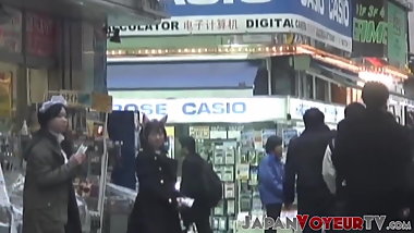 Asian schoolgirls seen working through voyeur lenses