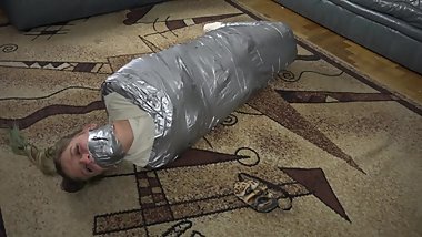 Blonde Teen Girl Violet Haze put in Duct Tape Mummification Bondage