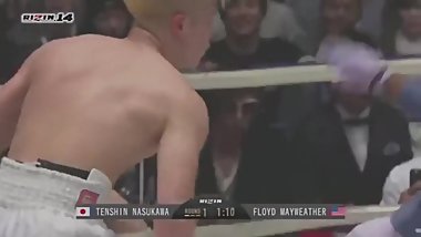 Tiny Asian takes two-minute pummelling from first black partner