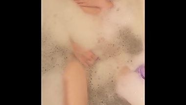 massaging self in the bath