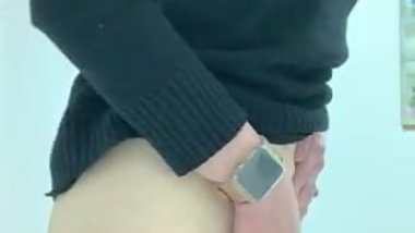 Taking off jeans and playing with herself