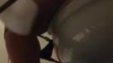 Cute college chick using dorm bathroom