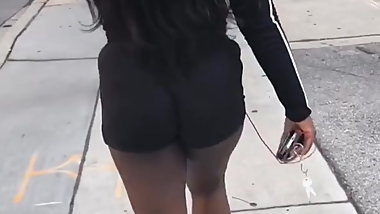 Thick Black Teen Walking In Basketball Shorts
