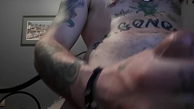 Teen with tattoos strokes dick with lotion till cumshot