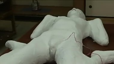 Asian teen mummification in plaster