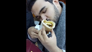 A guy having a little too much fun with his Kabab